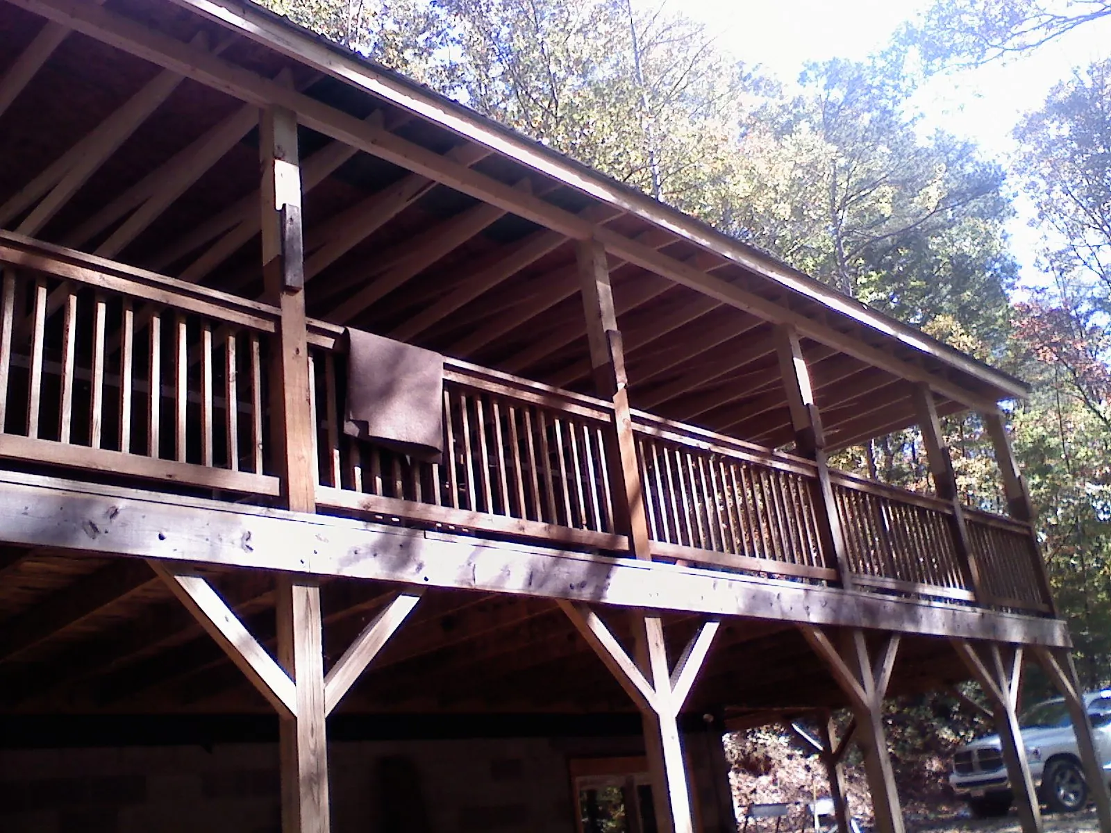 Timber framing under a new elevated porch and deck — Roof Leak Repair in Bunn by Roofing Brothers
